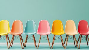 image showing a range of coloured chairs in a row.